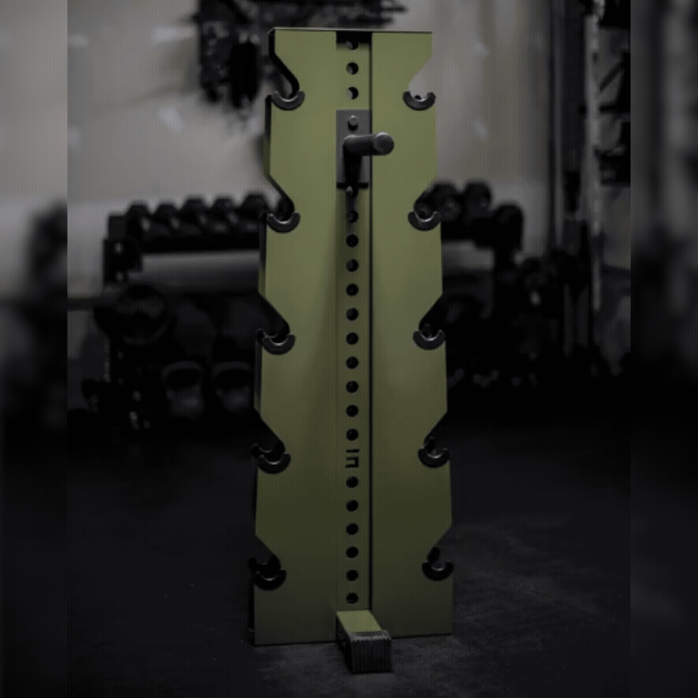 a short video of a military green 5-tier vertical dumbbell rack being mounted with dumbbells, weight plates using a weight plate holder accessory, and a barbell using a landmine attachment accessory.