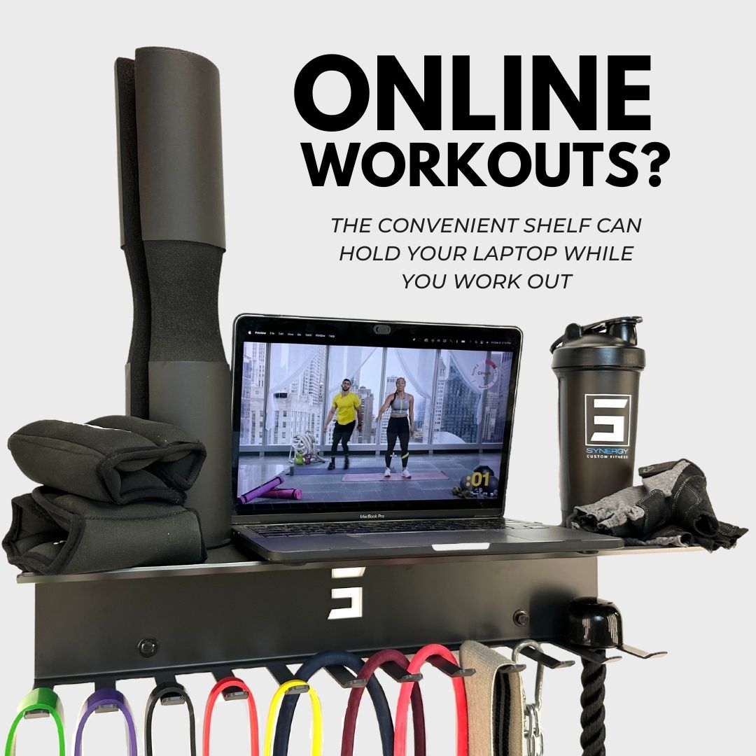 wall mount accessory hanger with shelf storing exercise equipment and a laptop