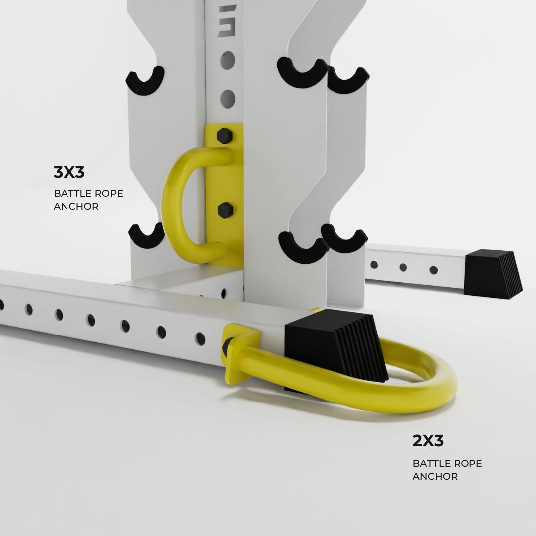 yellow battle rope anchors attached to a rack base
