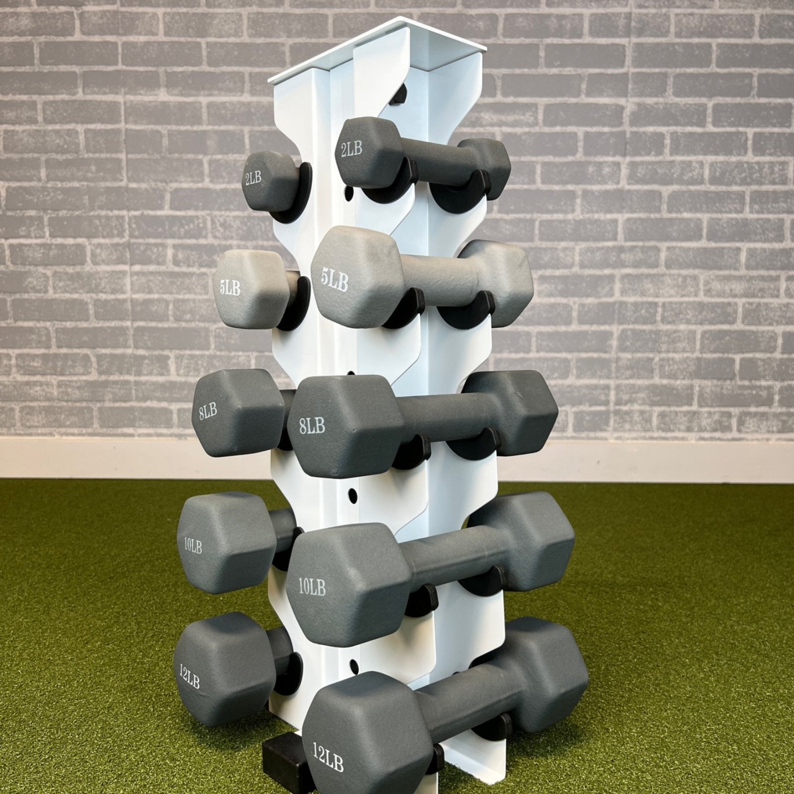 white charlie 5-tier vertical dumbbell storage rack loaded with neoprene dumbbells
