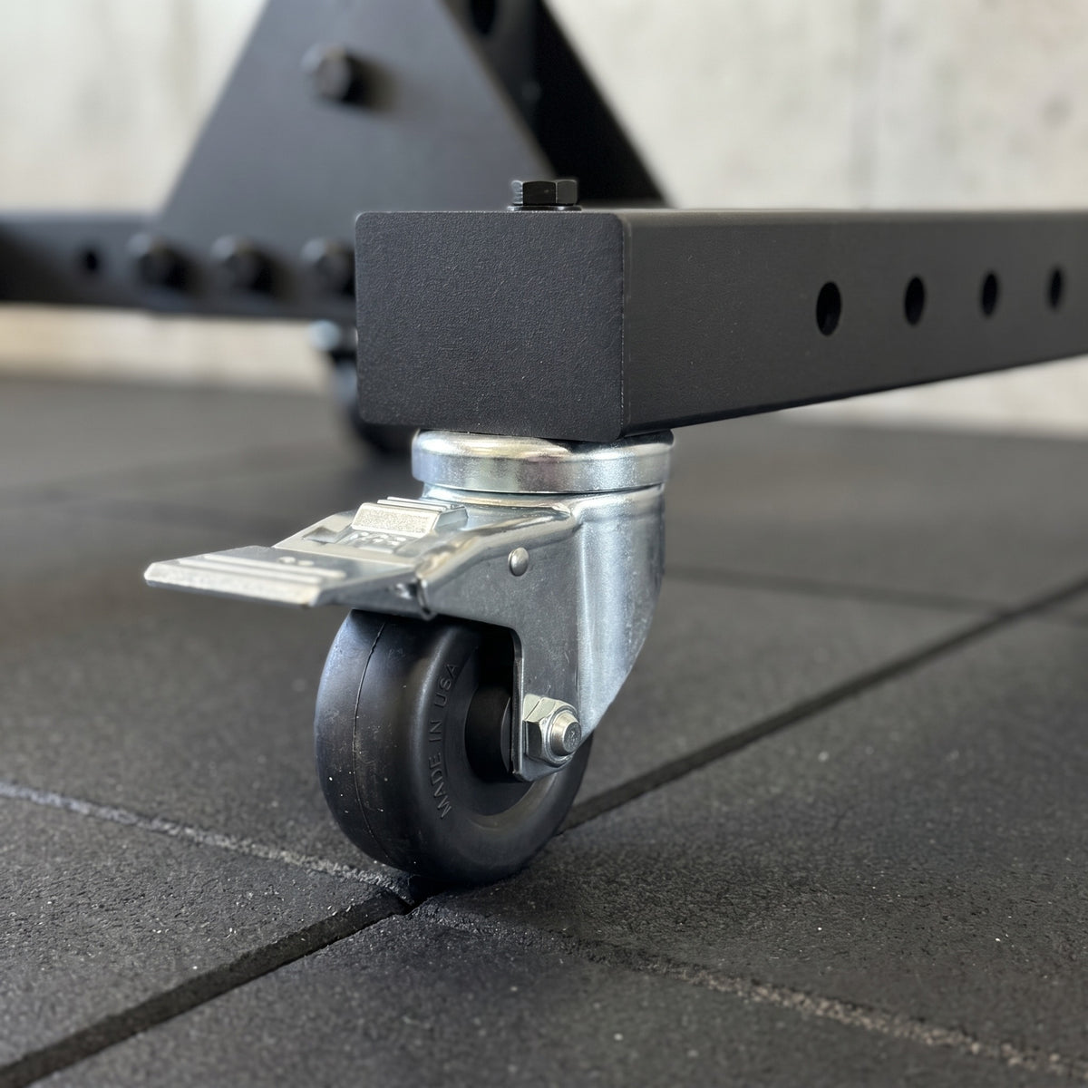 3 inch locking caster bolted under the Delta leg base