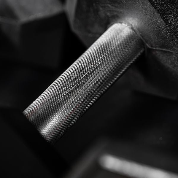 Close up of the medium knurling on a PRx straight handle dumbbell