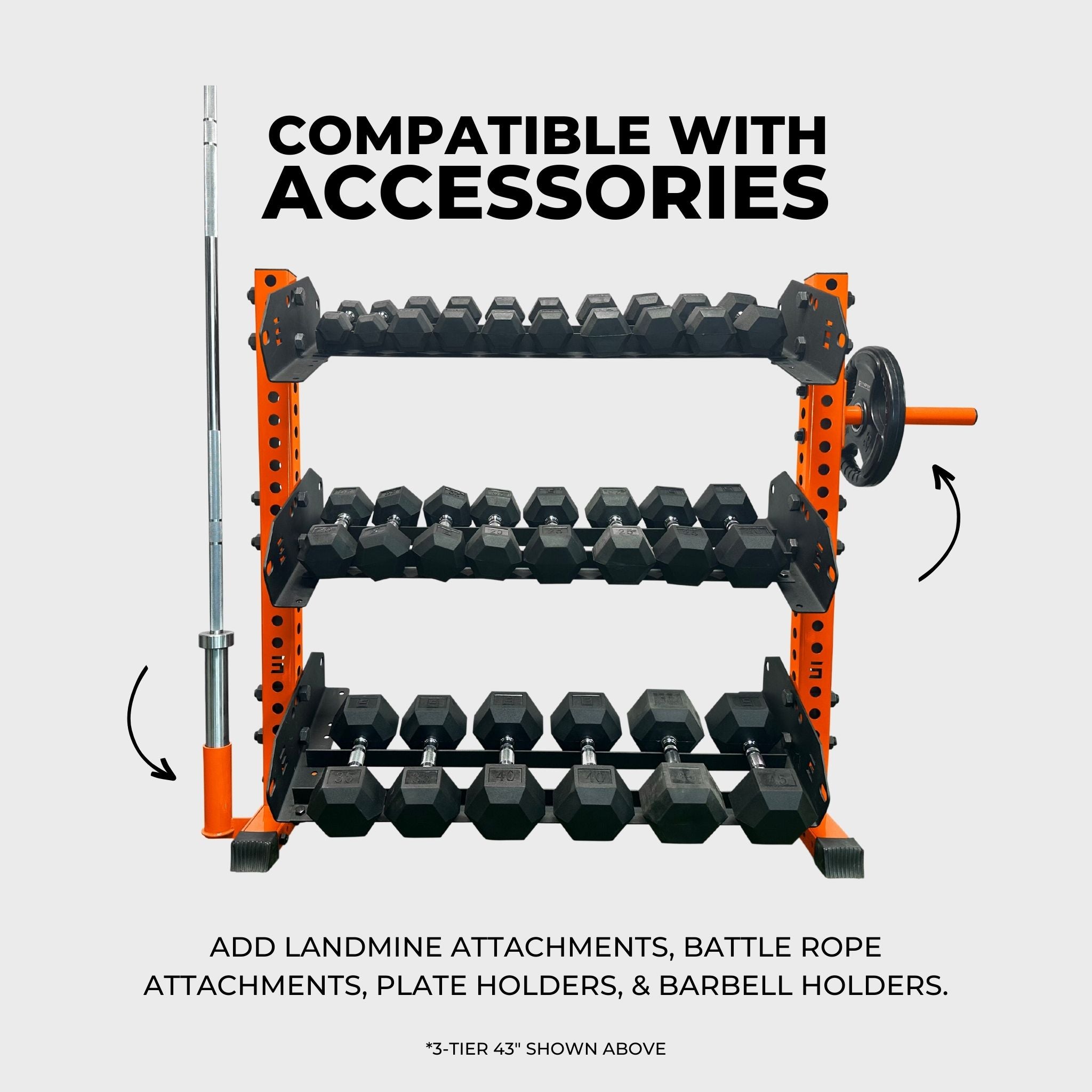 orange 3-tier horizontal dumbbell rack holding hex dumbbells, a barbell in a barbell holder attachment accessory, and a weight plate on a weight plate holder attachment accessory with text reading "compatible with accessories: add landmine attachments, battle rope attachments, plate holders, and barbell holders"