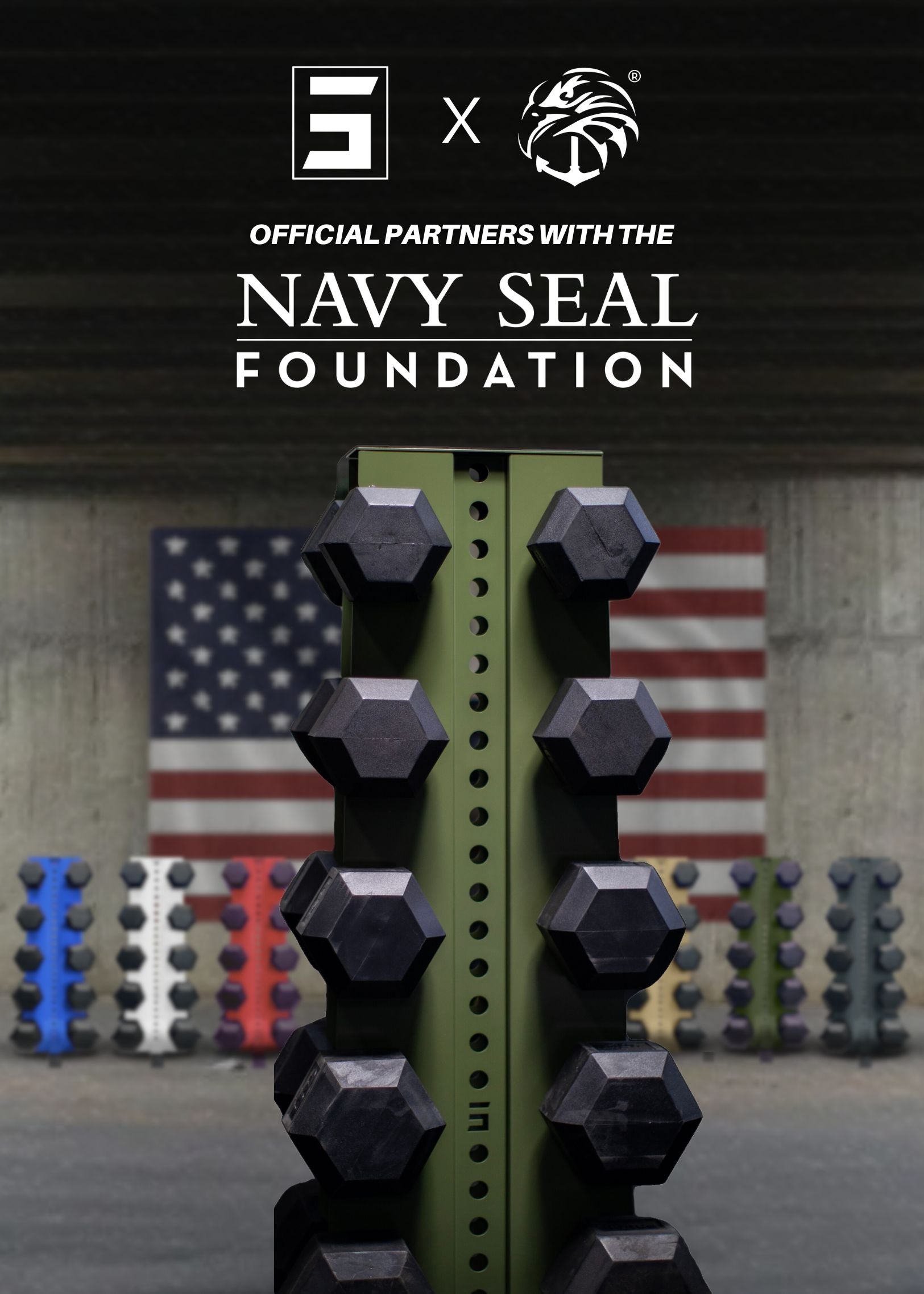 a 5-tier Synergy Custom Fitness military green vertical dumbbell rack holding dumbbells in a garage with an American flag and several other vertical dumbbell racks in the background with text reading in the foreground, "official partners with the Navy Seal Foundation"