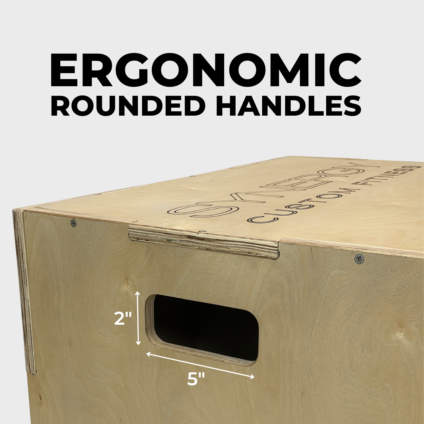 wooden plyo box handle with text reading "ergonomic rounded handles"