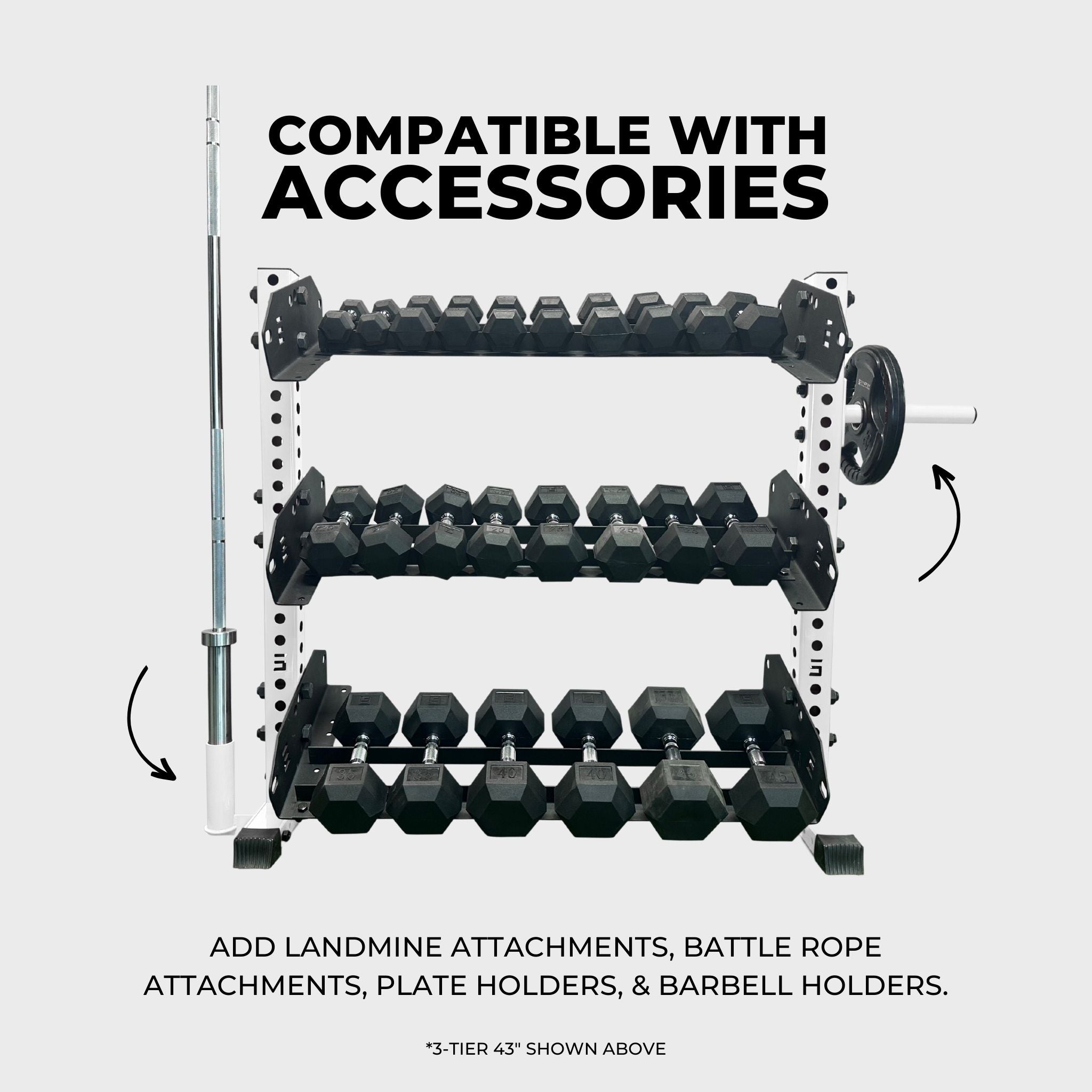 white 3-tier horizontal dumbbell rack holding hex dumbbells, a barbell in a barbell holder attachment accessory, and a weight plate on a weight plate holder attachment accessory with text reading "compatible with accessories: add landmine attachments, battle rope attachments, plate holders, and barbell holders"