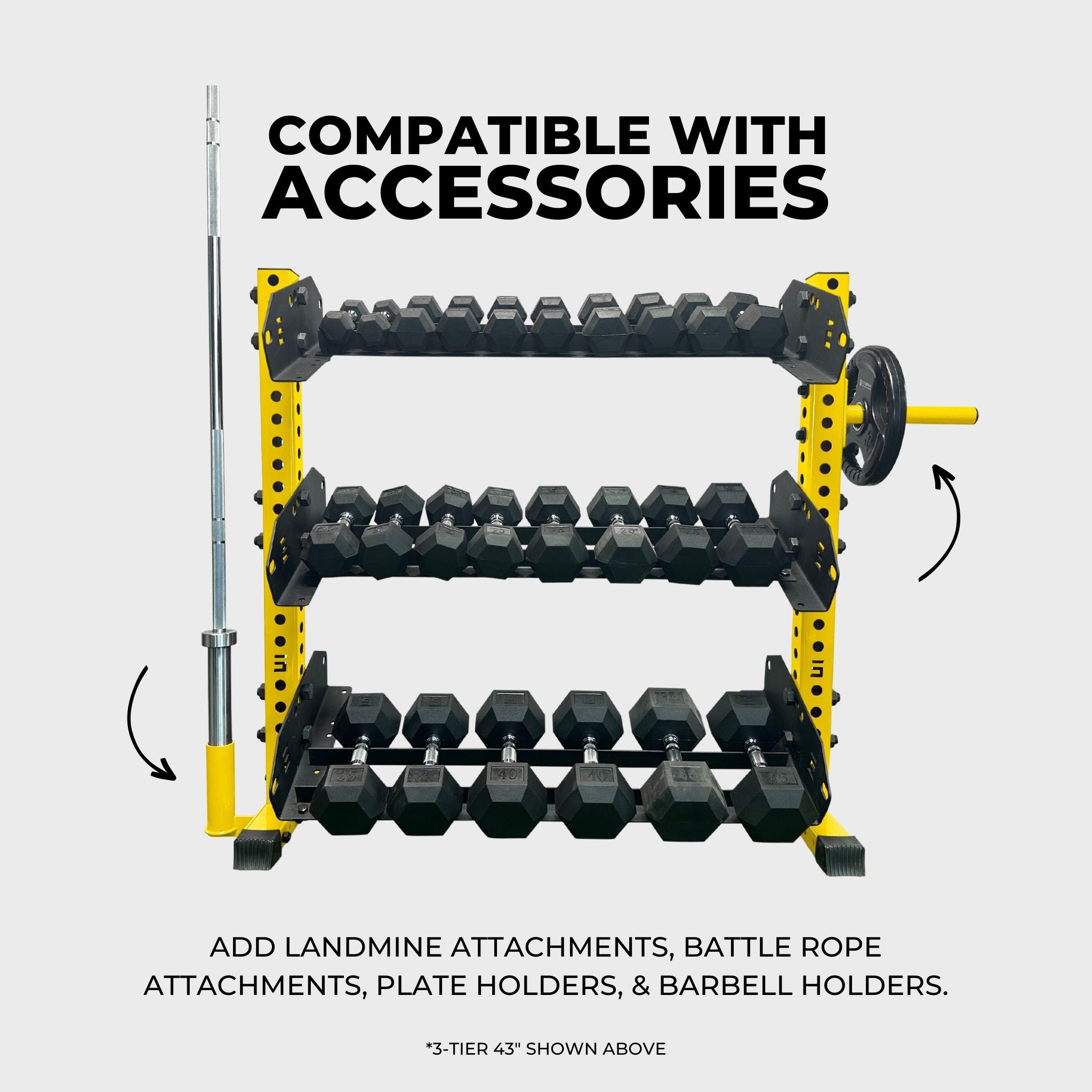 yellow 3-tier horizontal dumbbell rack holding hex dumbbells, a barbell in a barbell holder attachment accessory, and a weight plate on a weight plate holder attachment accessory with text reading "compatible with accessories: add landmine attachments, battle rope attachments, plate holders, and barbell holders"