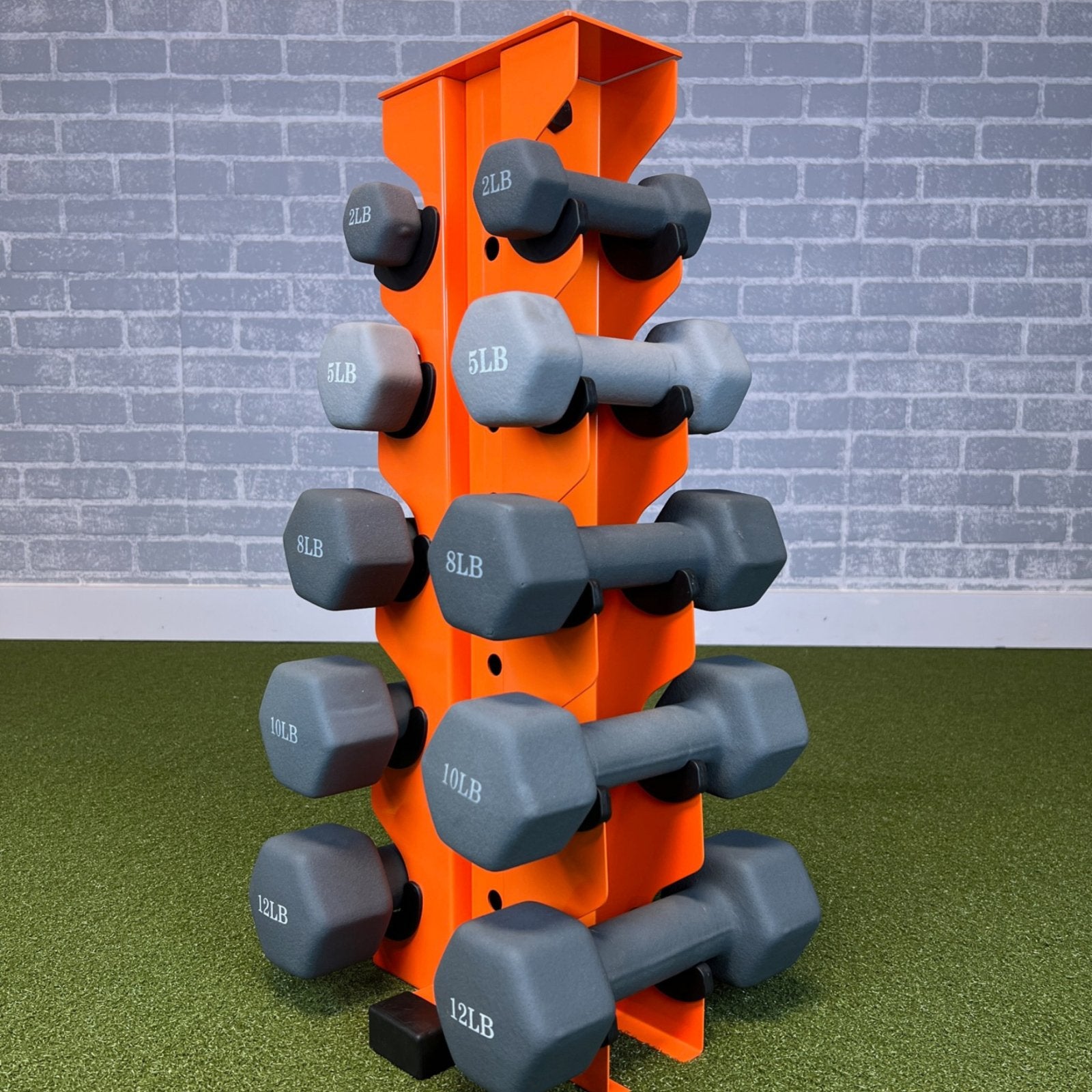 orange charlie 5-tier vertical dumbbell storage rack loaded with neoprene dumbbells