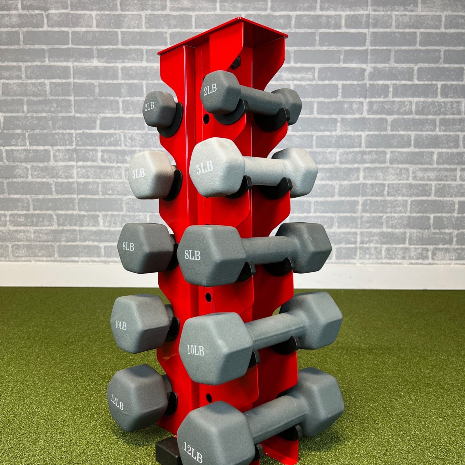 red charlie 5-tier vertical dumbbell storage rack loaded with neoprene dumbbells