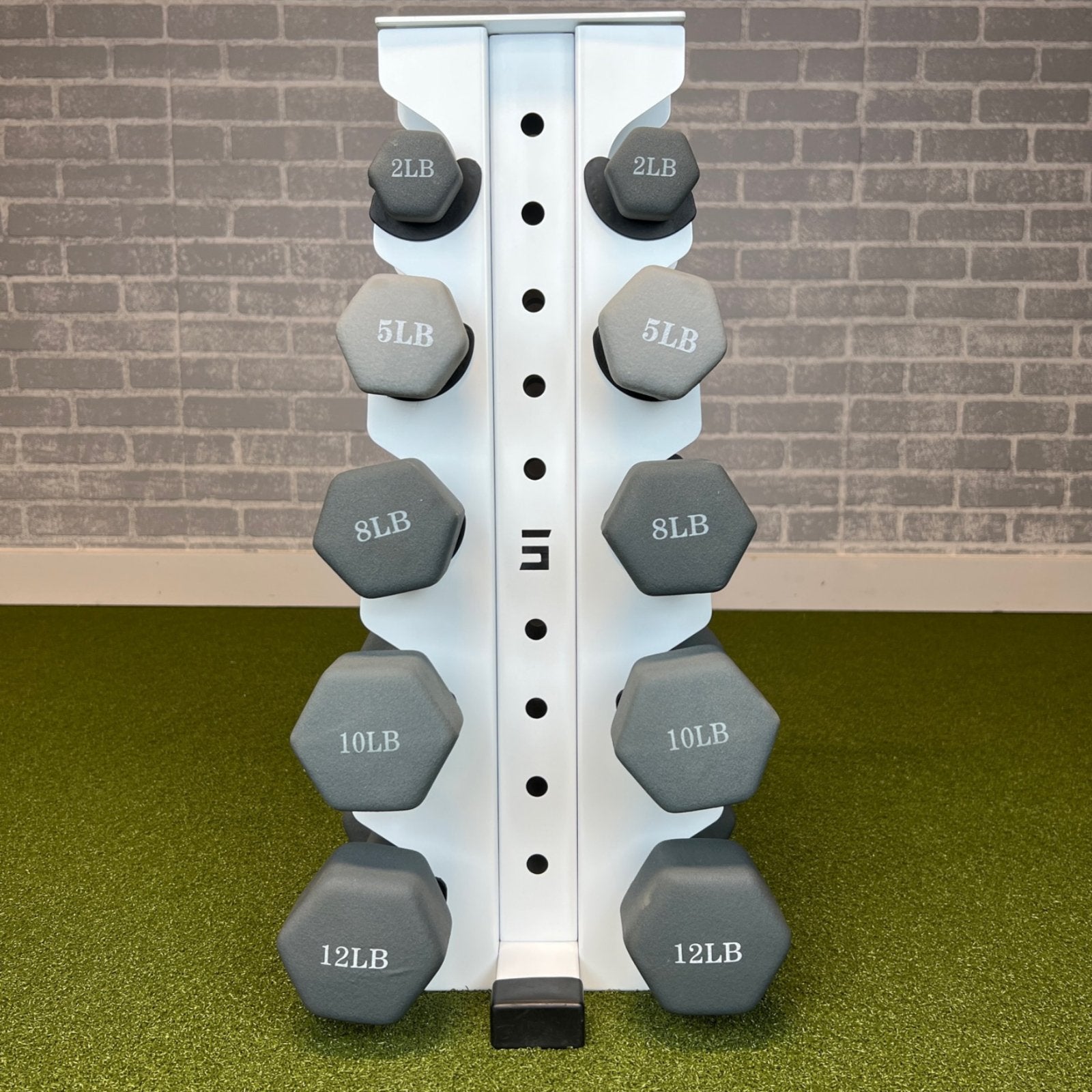 white charlie 5-tier vertical dumbbell storage rack loaded with neoprene dumbbells